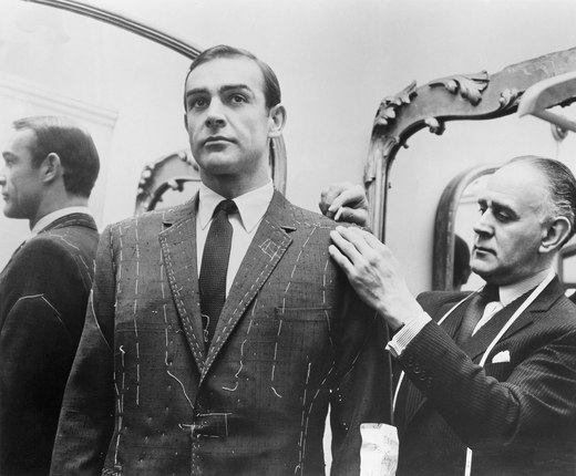 Sean Connery being measured for Bond.