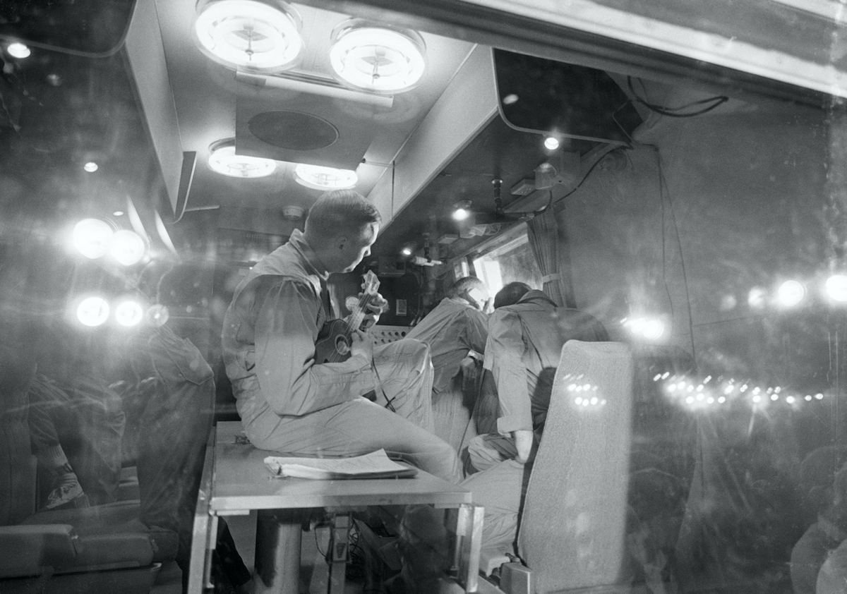 Neil Armstrong playing the ukulele in quarantine after returning from the Moon in 1969. Photograph © Nasa