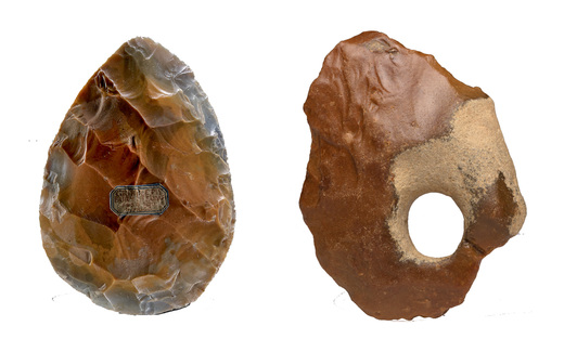 From left to right, twisted ovate handaxe, Grindle Pit, England, c.300,000 BCE; French flint handaxe c.500,000-300,000 BCE.