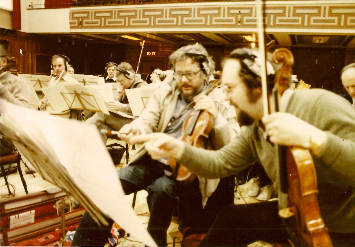 Alan Smyth (centre) and a colleague discuss the score at a recording session not with the Beatles