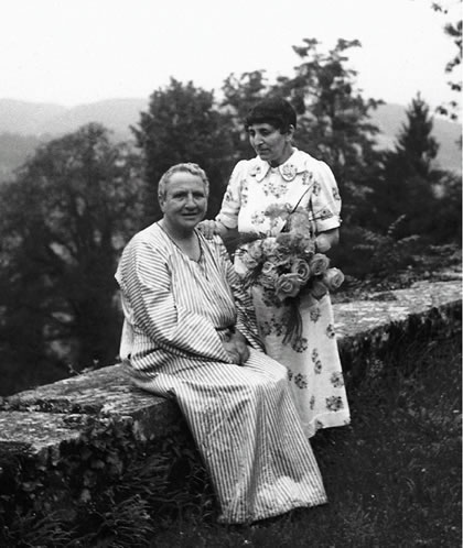 Gertrude Stein and Alice B. Toklas, as seen by Cecil Beaton on the terrace at Bilignin, 1936.